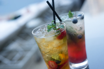 Summer Cocktails on glossy table 