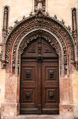Fototapeta na wymiar Decorative wooden doors at the old town hall in Prague