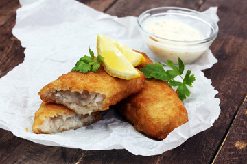traditional British fish on wooden background
