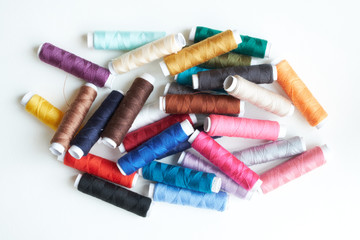 Colored thread on white