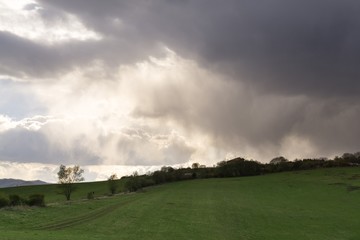 Obraz na płótnie Canvas Dramatic clouds, rain in distance. Slovakia