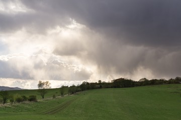 Obraz na płótnie Canvas Dramatic clouds, rain in distance. Slovakia