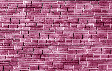 Fototapeta na wymiar Pink color brick stylized wall pattern.