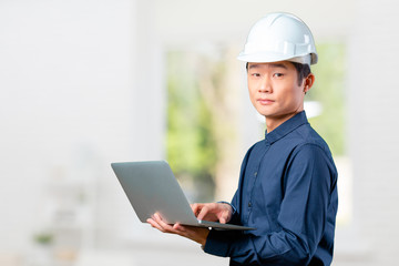 Man asian engineer with laptop