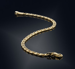 golden bracelet isolated on black