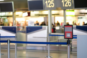 Waiting lines in front of check-in desks in airport