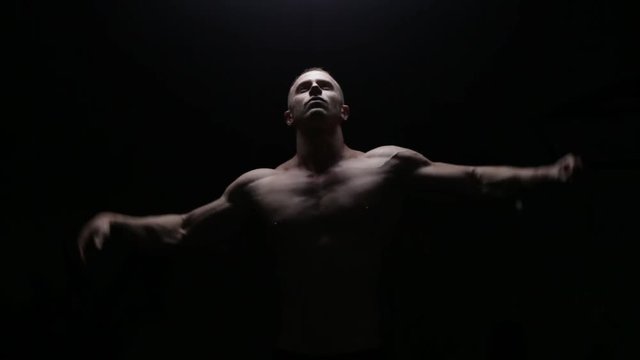 Muscle guy in dark