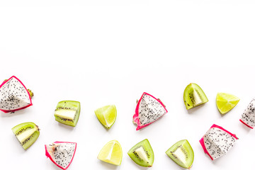 exotic fruits pattern with kiwi, pitaya isolated white background top view mockup