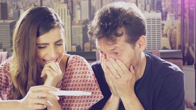 Woman in love discovering to be pregnant full of joy