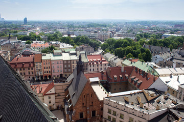 Fototapeta na wymiar Aerial view of the Cathedral of St. Barbara and the Jesuit Monastery, and other roofs of houses in the historic part of Krakow. Poland.
