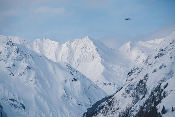 Bush Plane Flies over Glacier in Alaska 