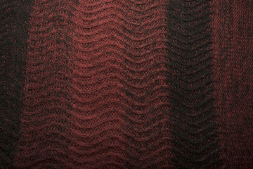 Texture of  black and red  wool sweater
