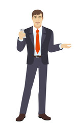 Businessman with mobile phone gesturing
