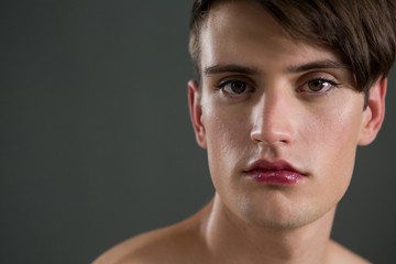 Obraz premium Shirtless androgynous man looking at camera