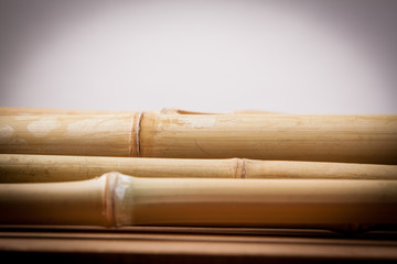 detail of bamboo stalks on a wooden table