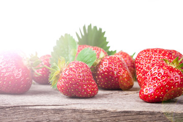 Fresh strawberries on a wooden table