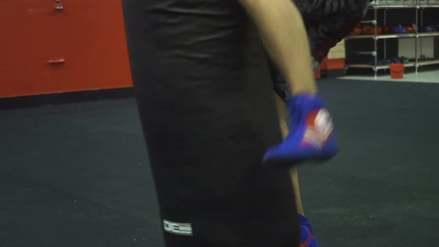 Guy Boxes In Gloves A Pear
