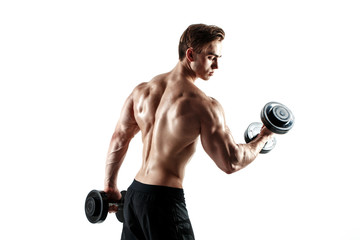 Fototapeta na wymiar Muscular bodybuilder guy doing exercises with dumbbells over white background