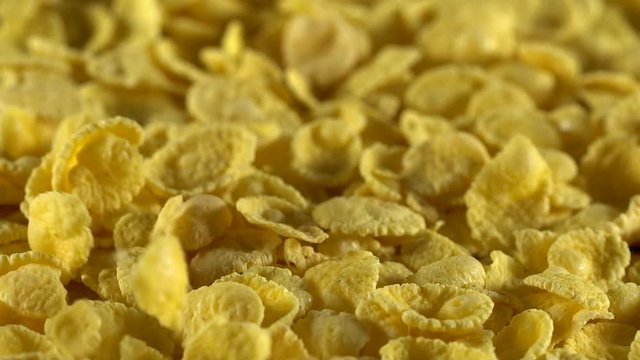 Crisp tasty cornflakes falling down.