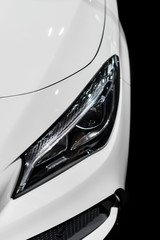 Close up projector headlight of the modern and elegant car