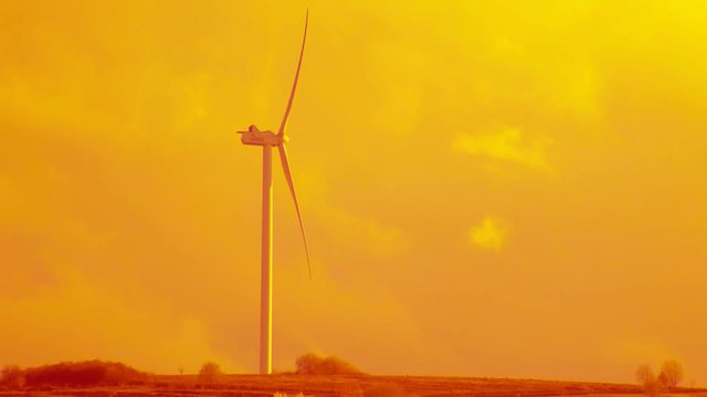 yellow -ocher grading wind power plant on Celestial background