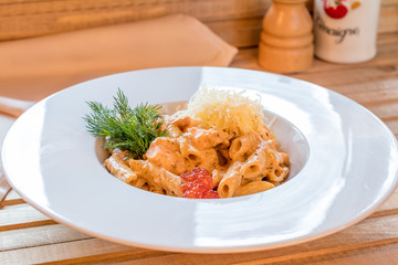 Penne with salmon and red caviar