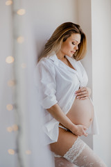beauty portrait of sexy pregnant glamour woman