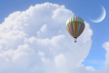 Aerostat flying above clouds . Mixed media