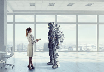 Scientists designing space suit. Mixed media . Mixed media © Sergey Nivens