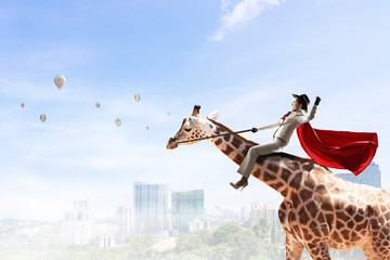 Businesswoman riding giraffe. Mixed media . Mixed media
