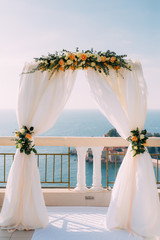 Arch for the wedding ceremony on the sea