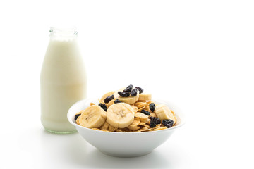 cereal with banana, raisin and milk for breakfast