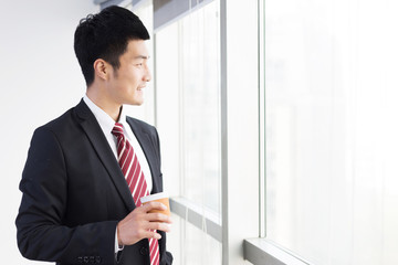 Fototapeta premium young chinese business man in modern office