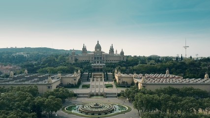 Aerial rising shot of Palau Nacional - National Palace museum in Barcelona, Spain