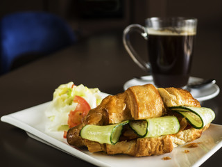 Croissant with fresh cucumber