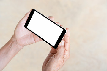 older person, hand holding and touch smart phone with blank white screen