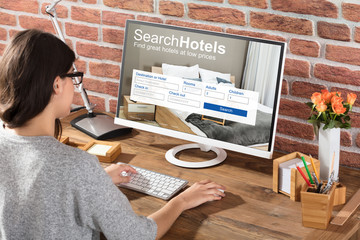 Woman Searching Hotels Online
