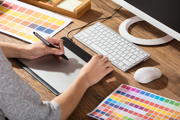 Graphic Designer Using Graphic Tablet