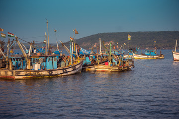CHAPORA, GOA, INDIA - MARCH 3, 2017: Fishing boats on Chapora port in Goa, India on March 3, 2017