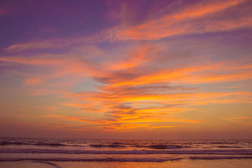 Naklejka na ściany i meble Amazing sunset at Arambol beach, North Goa, India