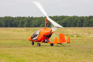 Fototapeta na wymiar Takeoff of gyroplane