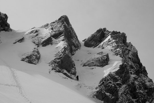 Fototapeta Climber on the mountain in black and white