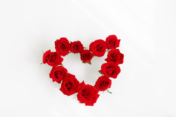 Heart Shaped Red Rose Arrangement on a White Background - 145199865