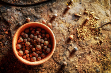 Top view of sweet-scented peppers in a wooden hub