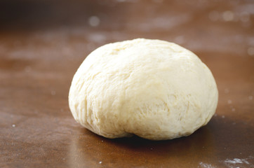 Fototapeta na wymiar Fresh bread dough prepare for baking on wooden board