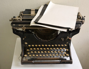 Old antique black typewriter, copying and plain paper, composition, vintage