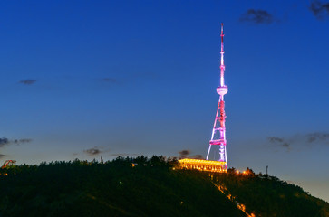 Fototapeta premium Television tower on the Mtatsminda mountain at night. Tbilisi, Georgia