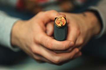 Vape after-sales service of the electronic cigarette. Glowing spiral for background. Personal vaporizer. ENDS.