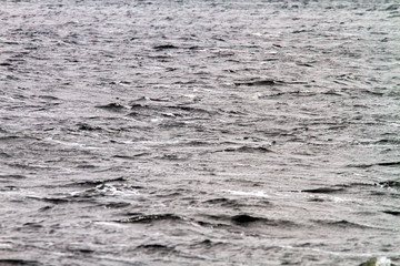 gloomy excitement in the middle of the sea in cloudy weather