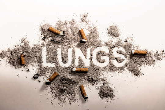Lung word in cigarette ash and bud as disease, illness, sickness, addiction, health care, medicine danger concept image